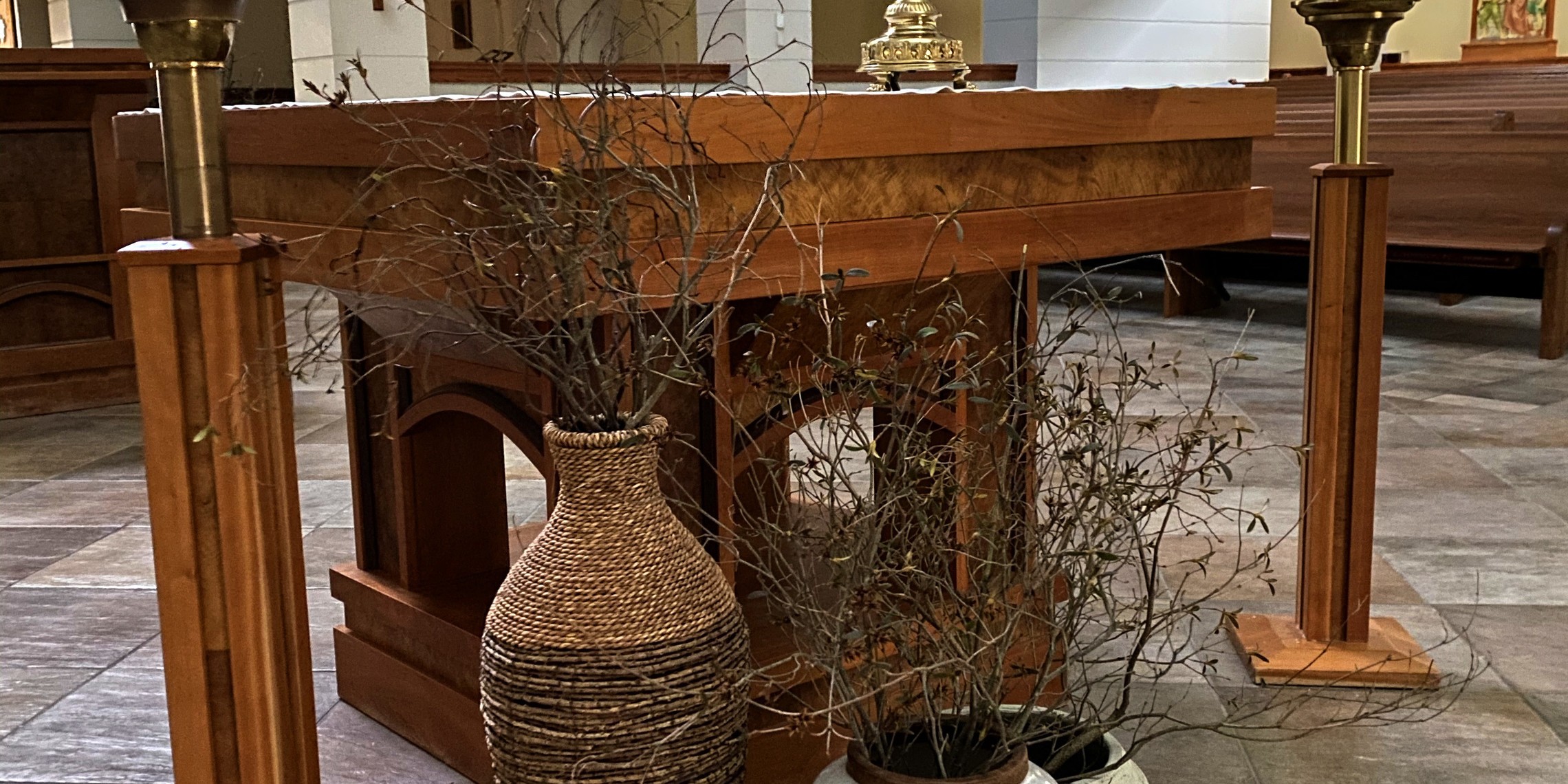 Altar during Lent decorated with clay pots and rocks